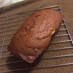 a loaf of bread sitting on top of a cooling rack