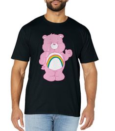 PRICES MAY VARY. Ripple Junction Officially Licensed Care Bears merchandise Are you loaded with luck? A Dreamer? Optimistic? Lovable? Or maybe sleepy or grumpy? Show your personality in this gear. Lightweight, Classic fit, Double-needle sleeve and bottom hem Novelty Pink Crew Neck T-shirt, Pink Novelty T-shirt With Funny Print, Pink Novelty Crew Neck T-shirt, Pink Crew Neck Novelty T-shirt, Care Bears Cheer Bear, Cheer Bear, Bear T Shirt, Care Bears, Branded T Shirts