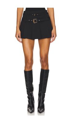 Find VERSACE Skirt on Editorialist. Versace Jeans Couture Skirt in Black. - size 36 (also in 38, 40, 42, 44, 46) Versace Jeans Couture Skirt in Black. - size 36 (also in 38, 40, 42, 44, 46) Self: 49% viscose 42% polyamide 9% elastane Lining: 100% polyester. Made in Italy. Hand wash. Unlined. Hidden side zipper closure. Adjustable buckled straps with gold-tone hardware. Pleated crepe fabric. Skirt measures approx 12.5 in length. VJEA-WQ9. E77HAE814_EN0394. Versace Skirt, Expensive Stuff, Versace Print, Couture Skirts, Fabric Skirt, Latest Skirts, Clothing Pieces, Fall 24, Fall Feels