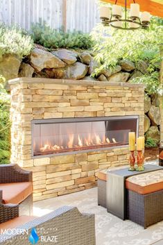 an outdoor fireplace is shown in the middle of a patio