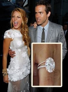 a man and woman standing next to each other with a diamond ring on their finger