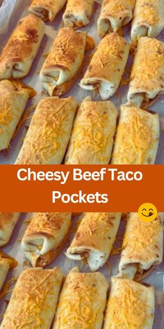 cheesy beef taco pockets on a baking sheet with text overlay that says cheesy beef taco pockets