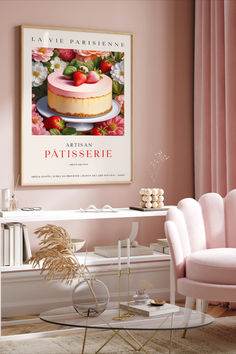 a pink living room with a cake on the table and a poster above it that says patisserie