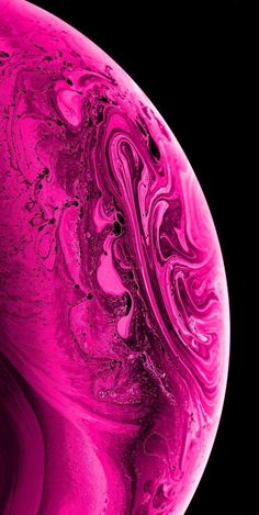 an image of the back side of a cell phone with pink swirls on it