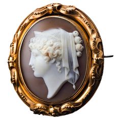 Welcome to Artisan Antiques based in Mayfair, London - We are delighted to offer this magnificent large antique 18ct gold shell cameo brooch/pendant locket made c.1860, depicting a figurehead of Hera - a Greek mythological goddess of women, marriage and childbirth (also referred to as Juno by the Romans). Its majestic presence, distinguished design and impressive size are immediately captivating even to the untrained eye and whilst undeniably attractive and delightful even at a quick glance, it Vintage Cameo Brooch, Victorian Style Cameo Brooch For Weddings, Victorian Cameo Brooch For Wedding, Antique Medallion Brooch For Wedding, Carved Yellow Gold Brooches For Wedding, Antique Carved Brooches For Weddings, Antique Cabochon Brooch For Wedding, Art Nouveau Cabochon Wedding Brooches, Art Nouveau Cabochon Brooches For Weddings