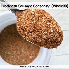 a spoon full of seasoning with the words breakfast sausage seasoning whole 30