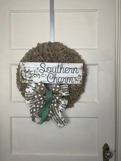 Farmhouse Burlap Southern Charm Wreath for your Front door. This Rustic Magnolia Southern wall decor is a year-round wreath to decorate your entryway, over a mantle, dining room, powder room, or front porch.  It would make the perfect handmade gift for a wedding, shower, housewarming, birthday,  Measurements:  21" H x 18" W x  5" D Please be sure to use a tape measure if you are unsure of how large or small the size of the wreath measures. Indoor/Outdoor use, but for longer lasting results displ Farmhouse Front Door Wreath, Southern Wall Decor, Burlap Wall, Farmhouse Front Door, Wall Wreath, Farmhouse Front, Wreath Farmhouse, Year Round Wreath, Round Wreath