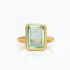 This beautiful stackable bezel set ring is made with rectangle shape faceted Green Amethyst gemstone. Gemstone size is approximately 13 x 18 mm. Please specify your size at checkout.Since I use natural gemstones, the stones may vary slightly in color, shape and size. Due to the nature of this stone there are natural inclusions and small internal cracks. This ring is available in two finishes:✦ 18K VERMEIL GOLD✦ BRIGHT STERLING SILVER Please specify your size and metal finish at the checkout.Ring Anniversary Emerald Ring With Bezel Setting, Anniversary Emerald Ring With Rectangular Stone, Classic Rectangular Birthstone Ring, Classic Rectangular Gemstone Birthstone Ring, Rectangular Emerald Ring With Bezel Setting, Rectangular Emerald Ring With Bezel Setting As Gift, Classic Emerald Ring With Rectangular Bezel Setting, Classic Rectangular Emerald Ring With Bezel Setting, Rectangular Emerald Ring As A Gift