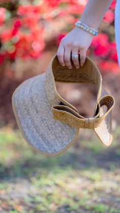 Ready for some fun under the sun? We got you covered this spring and summer...literally. Handmade from palm leaves, the Priscilla bow sun hat is the must have summer accessory. Wear this darling sun hat with your hair up in a bun or down and loose. It's perfect for whether you are spending the day at the beach or just going for a causal trip to gardening in your backyard. FINAL SALE Ready to ship! Please allow 1-2 business days to process your order and ship. Details: 100% Palm leaves 100% cotto Summer Straw Hat With Bow For Vacation, Spring Straw Sun Hat With Bow, Straw Hat With Bow For Vacation, Adjustable Bow Sun Hat For Garden Party, Spring Vacation Sun Hat With Bow, Summer Vacation Sun Hat With Bow, Summer Beach Straw Hat With Bow, Spring Straw Boater Hat With Visor, Summer Straw Boater Hat With Visor