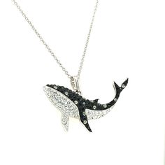 This playful necklace features a sterling silver Orca whale pendant that has been decorated with black and white Swarovski crystals to create a dazzling contrast. The pendant suspends from a strong sterling silver cable chain that adjusts in length from 18 to 20 inches. Sterling Silver Swarovski Crystals: Black and White Polished Finish Adjustable Cable Chain: 18-20 inches Spring Ring Clasp Orca Jewelry, Black And White Crystals, Whale Pendant, Crystals Black, Orca Whale, Whale Necklace, Red Tourmaline, Blue Star Sapphire, Spessartite Garnet