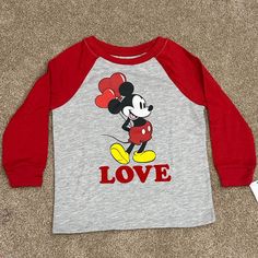 Disney Mickey Mouse Valentines Day Shirt Family Matching Mickey Mouse Tops For Disney Trips, Family Matching Mickey Mouse Cotton Tops, Cute Long Sleeve Tops For Disney Fan Events, Disney Minnie Mouse Long Sleeve Tops, Cute Long Sleeve Minnie Mouse T-shirt, Family Matching Long Sleeve Tops With Character Print, Cute Minnie Mouse Long Sleeve T-shirt, Playful Long Sleeve Minnie Mouse Top, Long Sleeve Tops With Letter Print For Disney Trips