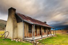 an old run down house in the middle of nowhere