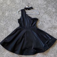 Gorgeous One Shoulder Dress With A Nice Shimmer Black Lined Mini Dress For Party, Lined Black Mini Dress For Party, Black Lined Mini Dress For Night Out, Lined Black Mini Dress For Night Out, Edgy Black Mini Dress For Party, Edgy Black Dress For Going Out, Black Dresses For Party Season Going Out, Edgy Black Dress For Night Out, Edgy Black Formal Dress