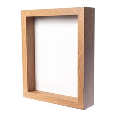 a wooden frame with a white background in the center and bottom section on top of it