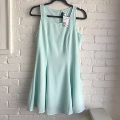 Nwt H & M Light Mint Green Dress New Size 8 Love This Mint Color ! New With Tags Really Cute Flattering At Waist Line Dress Zippered Back Fully Lined Size 8 Measurements Approximately 32” Length 17” Armpit To Armpit Cute For A Lunch Or Just Day Dress! Blue Sleeveless H&m Dresses, H&m Blue Sleeveless Dress, Knee-length Summer Dresses By H&m, Fitted Summer Dresses By H&m, H&m Green Midi Dress For Spring, H&m Summer A-line Dresses, H&m A-line Dresses, Fitted H&m Summer Dresses, H&m Knee-length Summer Dresses