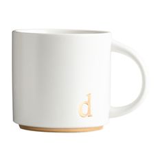 a white coffee mug with the letter d on it's side and a wooden handle