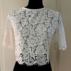 Crop White Lace Blouse/ Top New Without A Tag Never Worn Size: S/M Very Elegant Top, Nice To Wear With Jeans Or Skirt Measurements: Lenght: Approximately 15-16" From Back To Hem. Chest: Approximately 19-19.5" Back Zipper Closure Fitted Cropped Blouse With Lace Top, Fitted Cropped Lace Top Blouse, Cropped Lace Top For Spring, Lace Cropped Top For Spring, Fitted Lace Top Cropped Blouse, Elegant Spring Lace Crop Top, Fitted Crew Neck Blouse With Lace Top, Elegant Cropped Blouse With Lace Top, Fitted Cropped Lace Blouse