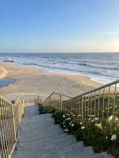 stairs lead down to the beach and ocean