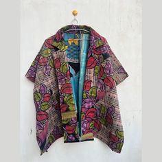 Vintage  cotton kantha jacket,Handmade kantha Quilted round top coat, Bohemian Hippie style Jacket amazing discounted price Introducing our exquisite Premium Collection Patchwork Blanket Coats, where every garment embodies a tale of its own. Crafted with meticulous care and unparalleled artistry, each coat is an individual masterpiece, a fusion of history and craftsmanship. At the heart of these extraordinary creations lie vintage kantha fabrics, each carrying its own narrative, woven into the v Bohemian Short Sleeve Outerwear For Fall, Bohemian Multicolor Handloom Kurta, Bohemian Multicolor Kurta With Batik Print, Bohemian Multicolor Kurta For Fall, Bohemian Multicolor Short Sleeve Kurta, Bohemian Multicolor Batik Print Kurta, Bohemian Multicolor Kalamkari Print Tops, Festival Cotton Patchwork Outerwear, Bohemian Hooded Patchwork Outerwear