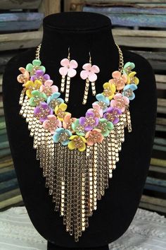 Multicolor Floral Beaded Chain Jewelry, Multicolor Flower-shaped Beaded Chain Jewelry, Flower-shaped Colorful Beads Jewelry For Party, Colorful Beaded Metal Jewelry For Party, Colorful Beads Metal Jewelry For Party, Bohemian Flower Jewelry For Party, Party Jewelry With Colorful Beads In Metal, Party Jewelry With Colorful Metal Beads, Colorful Beaded Dangle Jewelry For Party