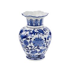 a blue and white vase with flowers on it