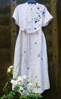 ❤ The beige linen hand embroidered dress is very soft, skin friendly, breezy and comfortable. ❤ Item description: - A lovely dress with embroidered butterfly pea flower motifs. - Has 2 hidden sides pockets and 1 linen belt. - Material: linen, embroidery threads. - Environmentally friendly. - This dress is very useful, go with any outfit, that can be used to go to school, go out, go shopping. It is a perfect gift for yourself or your beloved. ❤ Care instructions: The best way to wash embroidery c Hand Embroidery On Dress, Spring Garden Party Linen Embroidered Dress, Spring Dress With Butterfly Embroidery And Short Sleeves, Spring Dresses With Butterfly Embroidery And Short Sleeves, Beige Linen Dress With Floral Embroidery, Hand Embroidered Dress, Hand Embroidery Dress, Butterfly Pea Flower, Butterfly Pea