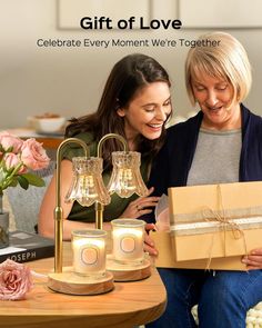 two women sitting on a table with gifts in front of them and the caption reads, celebrate every moment we're together