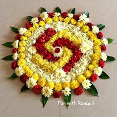 an arrangement of flowers arranged in the shape of a spiral