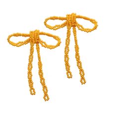 Prepare for compliments with our Gracie Beaded Bow Earrings. Each earring is hand-strung with glass beads in the color of your choice. These statement earrings add the perfect feminine touch to everyday wear or a special-occasion ensemble. Beaded Bow, Bow Earrings, Earring Necklace, Statement Earrings, Glass Beads, Special Occasion, Everyday Wear, Beads, Yellow