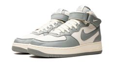 The Nike Air Force 1 Mid "Mica Green" is a clean colorway of the classic lifestyle shoe with vintage-inspired details.  The sneaker features a Coconut-Milk-colored canvas base with Mica Green leather overlays and Swoosh branding.  Mica Green leather also lands on the adjustable ankle strap.  Vintage-inspired Coconut Milk laces match the tongue and Swoosh embroidery on the side of the strap.  Green “Nike Air Force 1 Mid” branding appears on the tongue tag.  Underfoot, the cream rubber midsole gives this version of the Air Force 1 Mid an old school, aged look.  Release date: April 25, 2023 Green Nike Air Force, Classic Lifestyle, Nike Air Force 1 Mid, Air Force 1 Mid, Stadium Goods, April 25, Green Shoes, Nike Air Force 1, Green Leather