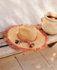 Large natural raffia hat with chenille and lurex hatband. The fringed brim is decorated with brushstrokes of contrasting colour. Made in Italy. Adjustable Fringe Fedora Straw Hat, Bohemian Hat With Fringe And Curved Brim, Bohemian Fringe Fedora Hat, Wide Brim Fringe Hat For Festivals, Bohemian Fedora Hat With Fringe, Bohemian Brimmed Sun Hat With Fringe, Raffia Hat, Heirloom Gifts, Pet Holiday