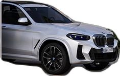 the front end of a white bmw suv