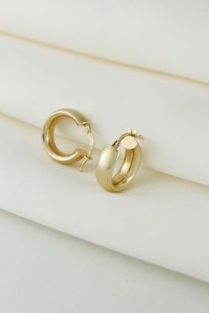 These 10K Classic Gold Hoop Earring has a Beautiful and Elegant look.  These Real Gold Hoop Earrings are Timeless Classic, these must-have hoops never go out of style. A great addition to your Jewelry Collection. Its a PERFECT GIFT for Any Occasion. Safe for people with sensitive skin. Comfortable to wear all day. Guaranteed 10 Karat Solid Gold Classic Hoop Earrings Metal: 10k Solid Gold Stamp: 10k  Dimensions Thickness - 5.5 mm Inside Diameter - 10.5 mm Outer Diameter - 16.35 mm  Post Thickness Real Gold Hoop Earrings, Thick Gold Hoops, Thick Hoop Earrings, Earrings Everyday, Earrings Metal, Hoops Earrings, Jewelry Lookbook, Classic Gold, Gold Hoops