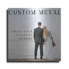 a man and woman standing next to each other in front of a metal plaque that reads custom metal print your favorite memory