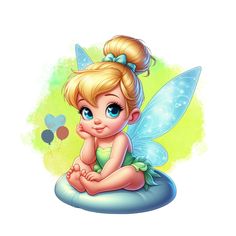 a cute little fairy sitting on top of a pillow