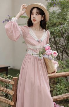 Feel ethereal like a pink fairy in this chiffon dress with a v-neckline, lace inserts, long puff sleeves and swishy midi skirt. Concealed back zipper. Lined. S: 32"-34" chest, 24"-26" waist, 45" lengthM: 33.5"-35.5" chest, 25.5"-27.5" waist, 45" lengthL: 35"-37" chest, 27"-29" waist, 45" length Spring Midi Dress With Lace Puff Sleeves, Pink Summer Dress With Lace Sleeves, Pink Summer Dresses With Lace Sleeves, Pink Lantern Sleeve Midi Dress For Spring, Pink Dress With Lace Sleeves For Spring, Spring Midi Dress With Lace Sleeves And V-neck, Feminine Pink Dresses With Lace Patchwork, Feminine Dress With Lace Patchwork And Puff Sleeves, Pink Lace Dress With Puff Sleeves