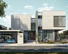 two people are standing in front of a modern house with cars parked on the driveway