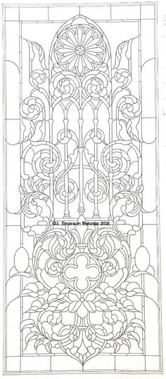 an old stained glass window with decorative designs