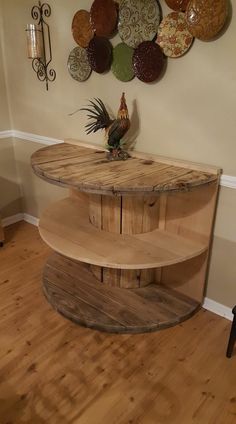 a wooden table sitting on top of a hard wood floor