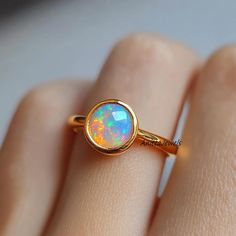 14K Gold Plated Ethiopian Opal Ring, Gold Opal Promise Wedding Ring, Gemstone Ethiopian Ring, Birthstone Opal Ring, Round Ethiopian ring Details:  💙Item: Ethiopian Opal Ring 💙Metal : 925 Silver 💙Gemstone:- Select From Variations 💙Size : Select From variations  AnittaJewels These items are handmade, All are designed and handmade in-house by me and team with precision, Perfect craftsmanship and strong interest! We are continuously listing new products in our store. So keep coming back to see more great updates in the store. The amazing quality & best price! Wholesale orders With Custom are welcome to message me for pricing information. Product color may slightly vary due to photographic lighting sources or your monitor setting. Kindly look for the beautiful and eye tempting jewelry at my Opal Promise Ring, Ethiopian Opal Multi-stone Ring, Silver Multi-stone Ethiopian Opal Ring, Natural Opal Ring, Ethiopian Opal Multi-stone Jewelry In Yellow Gold, Multi-stone Ethiopian Opal Jewelry In Yellow Gold, Ethiopian Opal Ring, Ring Opal, Opal Ring Gold