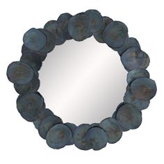 a circular mirror made out of metal discs