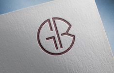 the letter b is inscribed in a circle with an arrow on it's side