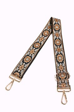 The latest in our lineup of gorgeous bag straps, the Mila is a must-have for anyone seeking a way to add feminine flair to their bag. The subtle floral print is suitable for wearing year-round, and with a strap this stunning, you'll want to. Details: Adjusts from 28.5”-52” 1.5” wide Gold hardware Adjustable Bag Strap, Adjustable Bag, Mocha Brown, Gorgeous Bags, Modern Chic, Bag Straps, Dusty Rose, Black Cream, Mocha