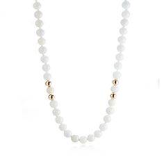 Nine stations of paired gold beads create added interest to this long white jade bead rope necklace. Since 1861, Gump's has been a destination for distinctive jewelry that offers a lifetime of enjoyment. To ensure each piece is created to our exacting standards, our expert in-house jewelry team oversees every step of the production process. The result is a statement of pure elegance. White jade beads, 6mm. 14-karat yellow gold beads, 5mm. 36" long. Classic White Beaded Chain Necklace, Elegant Rondelle Gemstone Beads, Elegant Gemstone Rondelle Beads, Elegant Jade Necklaces With Round Beads, White Pearl Rondelle Necklace With Gemstone Beads, White Rondelle Shaped Single Strand Beaded Necklace, White Single Strand Rondelle Beaded Necklaces, White Pearl Necklace With Rondelle Gemstone Beads, White Gemstone Beads Long Necklace