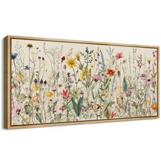 a painting on the wall with flowers and plants painted on it's sides, including grass