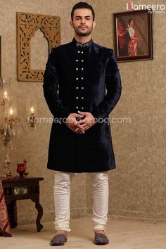 Pakistani Navy Blue Sherwani for Groom Online in Stylish design embellished with bead embroidered. This ethnic sherwani set is made from fine quality material. Sherwani: Our wedding sherwanis are designed using comfortable fabrics and are embellished with stone or crystal work. Wedding Sherwani fabric is Velvet. Pajama: Pakistani Navy Blue Sherwani for Groom Online is paired with Off White Churidar pajama which is giving charming look to sherwani. Fabric used for Pajama is Cotton Silk. Detailed Navy Blue Sherwani, Off White Churidar, Churidar Pajama, Sherwani For Groom, White Churidar, Blue Sherwani, Groom Dress Men, Crystal Work, Sherwani Groom