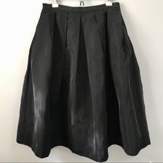 Lord & Taylor Black Midi Skirt Size: 8 Length Approx. 30" Nwt - New With Tags. See Photos. Has Pockets! Lined Side Zip & Clasp Closure Dry Clean Beautiful Skirt! Has A Lot Of Volume And Movement. Msrp: $124.00 **I Also Have This Skirt For Sale In My Closet In Cream/Ivory Color, Size 6.** Smoke-Free, Pet-Free Home. Prompt Shipping! Black A-line Pleated Skirt For Party, Black A-line Pleated Evening Skirt, Black A-line Pleated Party Skirt, Cocktail Black Pleated Skirt, Black A-line Bottoms For Party, Black Relaxed Fit Skirt For Cocktail Events, Black Pleated Skirt For Spring Formal Occasions, Black Pleated Skirt For Spring Formal Events, Black Relaxed Cocktail Skirt