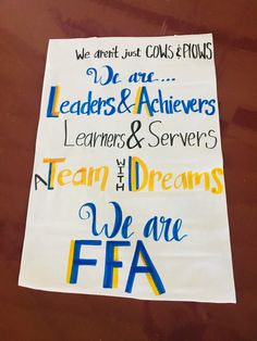 a piece of paper with words written on it that say we are faa and leaders & achievers