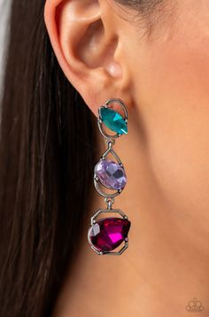 Linking together to create a geometric lure, a sleek silver oval, teardrop, and emerald-cut frame cascade down the ear. Slanted sideways in pronged settings across each frame, a fuchsia teardrop, purple oval-cut, and aquamarine marquise-cut gem create a gorgeous pop of color against the thin edgy frames. Earring attaches to a standard post fitting. Sold as one pair of earrings. Dance Earrings, Multicolor Earrings, Paparazzi Accessories, White Necklace, Blue Gems, Paparazzi Jewelry, Rhinestone Earrings, Emerald Cut, Post Earrings