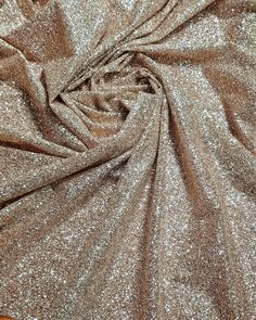 Gold Glitter fabric Wedding dress fabric Gold glued glitter Shining fabric Black Glitter Fabric Glitter fabric by roll Wedding fabric Gold and black glued glitter lace fabric Other glitter fabrics  https://www.etsy.com/shop/StyleFabric?ref=seller-platform-mcnav&section_id=25481787 *Width: 1.5 m = 59 in = 1.64 yards *Glitter fabric of high quality can be used for wedding and evening dresses. My clients are using this fabric for sewing for a long time and they are very satisfied with the quality. Glamorous Metallic Sequin Fabric For Wedding, Metallic Sequin Fabric With Shimmer For Wedding, Glamorous Glitter Tulle Fabric For Evening, Glamorous Glitter Print Sequin Fabric For Wedding, Metallic Shimmer Sequin Fabric For Wedding, Gold Glitter Sequin Fabric For Prom, Gold Sequin Fabric With Glitter For Prom, Glamorous Sparkling Tulle Fabric For Party, Sparkling Gold Sequin Fabric For Prom